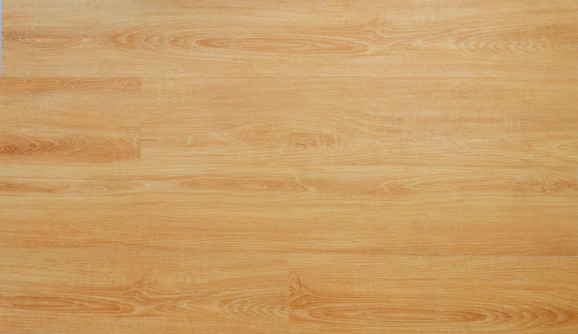 Smooth light wood grain texture ideal for backgrounds and design projects.